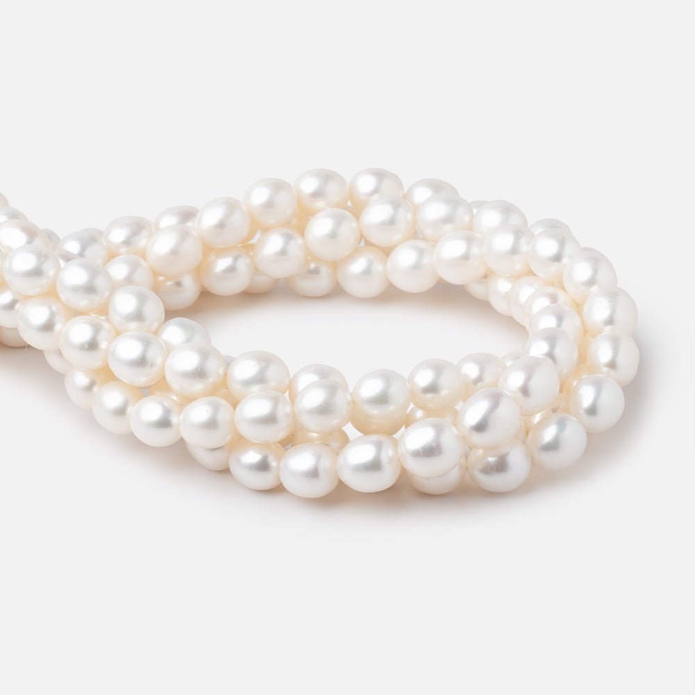 7.5x9mm Creamy Straight Drill Oval Freshwater Pearls 16 inch 40 Beads