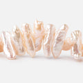 16x7-29x9mm Peach Side Drill Biwa Freshwater Pearls 15 inch 48 Beads