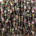 3mm Multi Tourmaline micro faceted round Trio Black Gold Chain by the foot 73 beads per