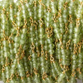 3mm Peridot micro faceted round Trio Gold Chain by the foot 73 beads per