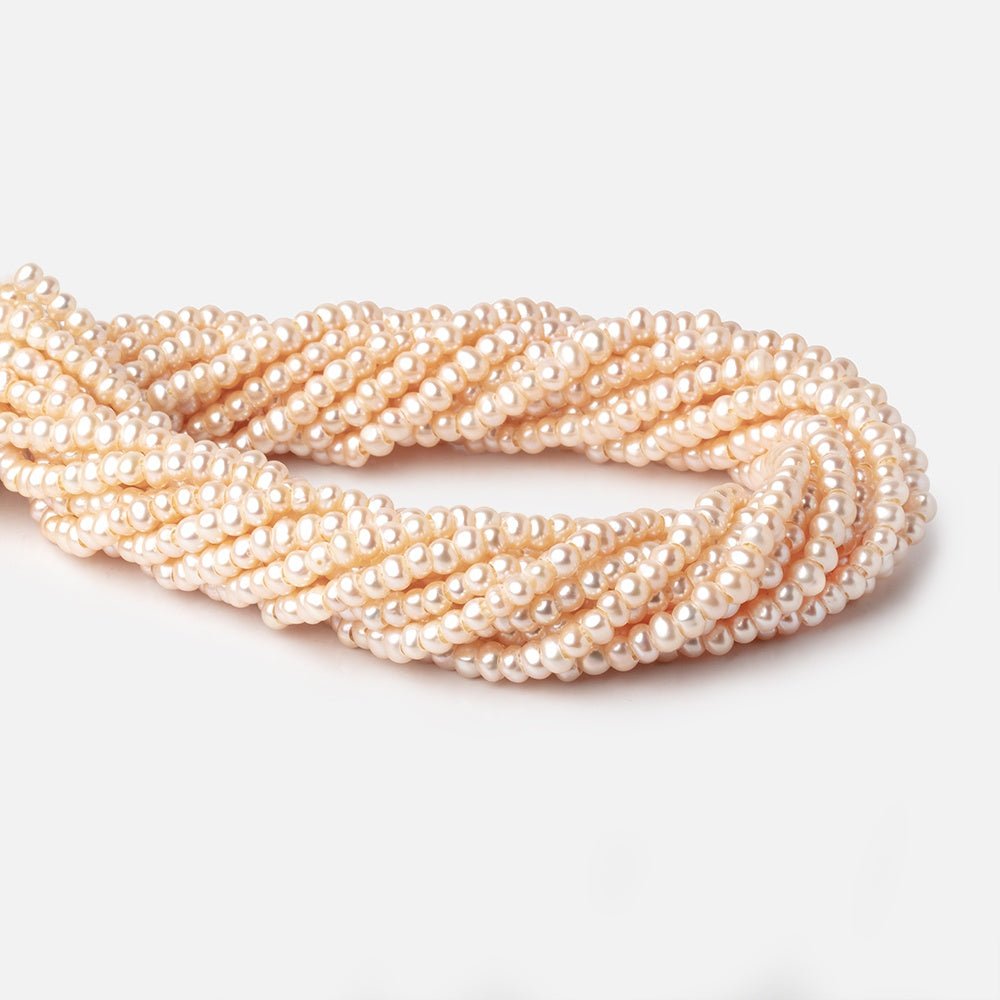 4.5-5mm Peach Off Round Large Hole Freshwater Pearls 15 inch 110 Beads
