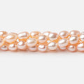 5-5.5mm Peach Petite Oval Freshwater Pearls 15.75 inch 75 Beads