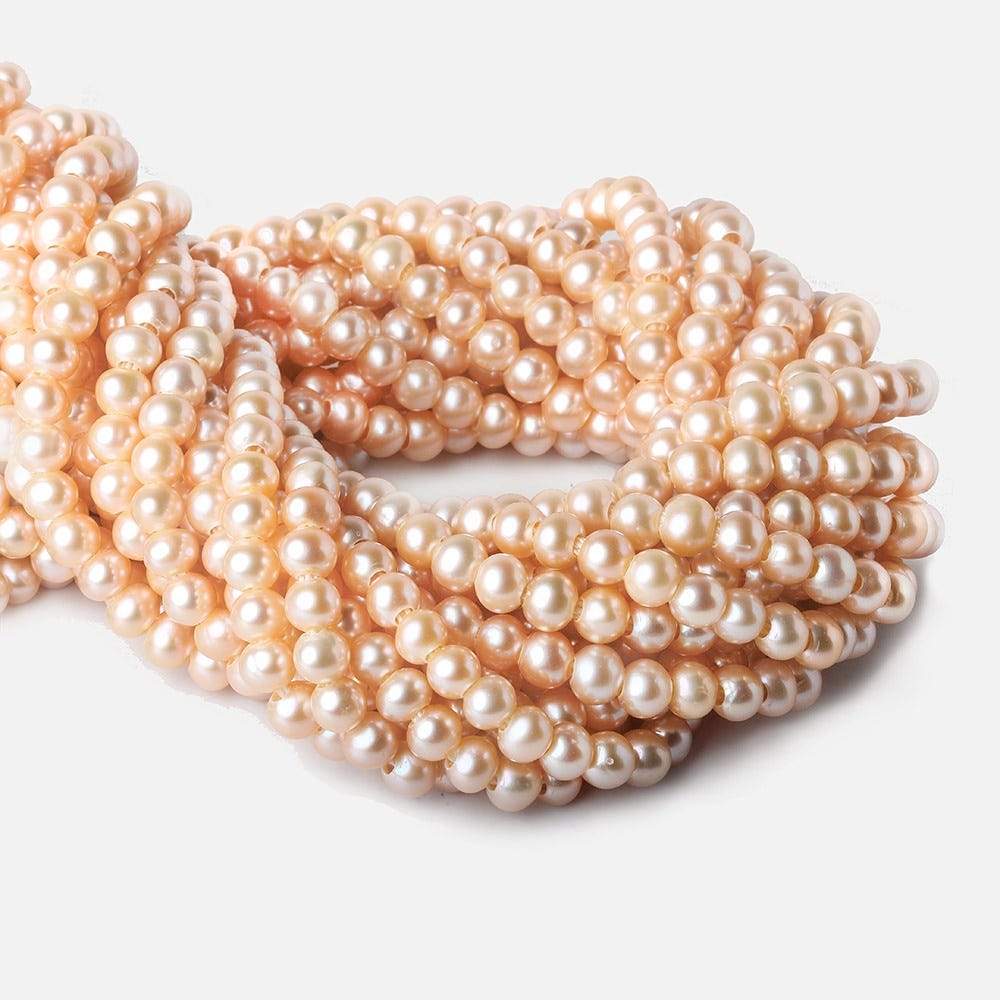 6-7mm Creamsicle Large Hole Off Round Freshwater Pearl 2.5mm drill hole, 15 inch, 75 pieces
