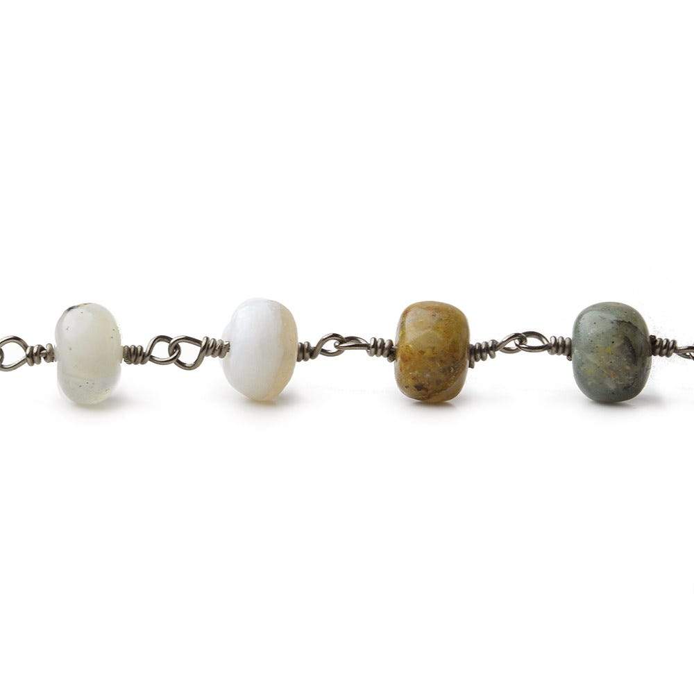 6.5mm Blue Peruvian Opal Plain Rondelle Black Gold plated Chain by the foot