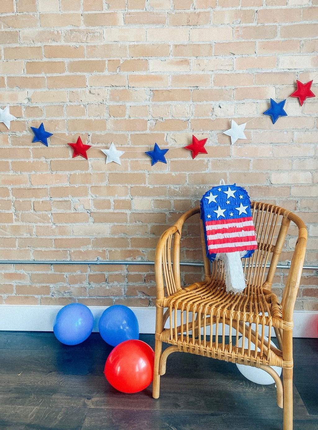 July Popsicle piñata (red,white,blue strips)