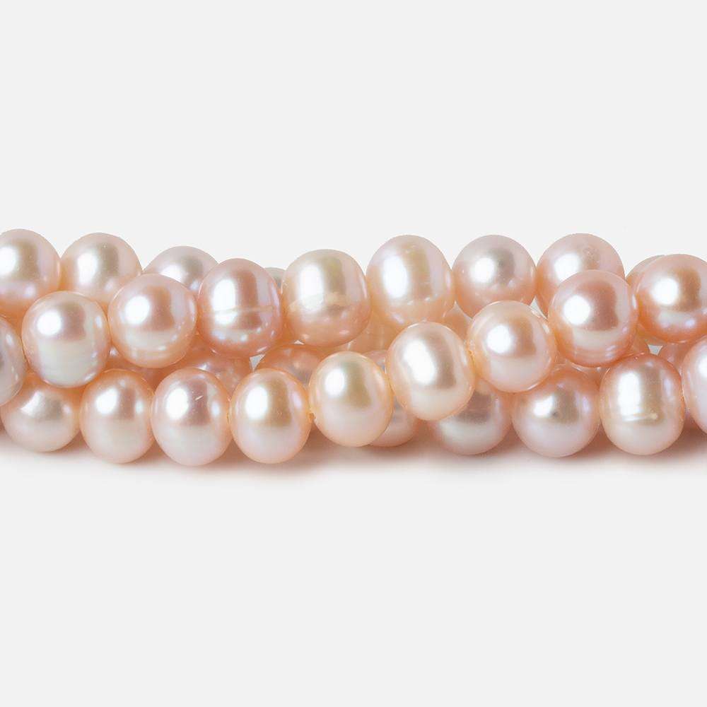7x6mm Orchid Pink Off Round Freshwater Pearls 67 pieces AAA