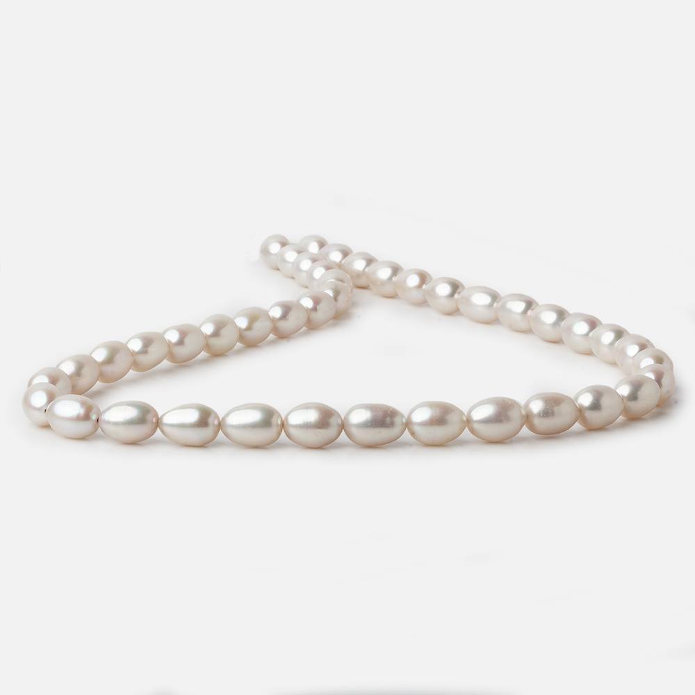 7x9-7x10mm Silver Champagne Straight Drill Oval Freshwater Pearl 16 inch 40 pieces A