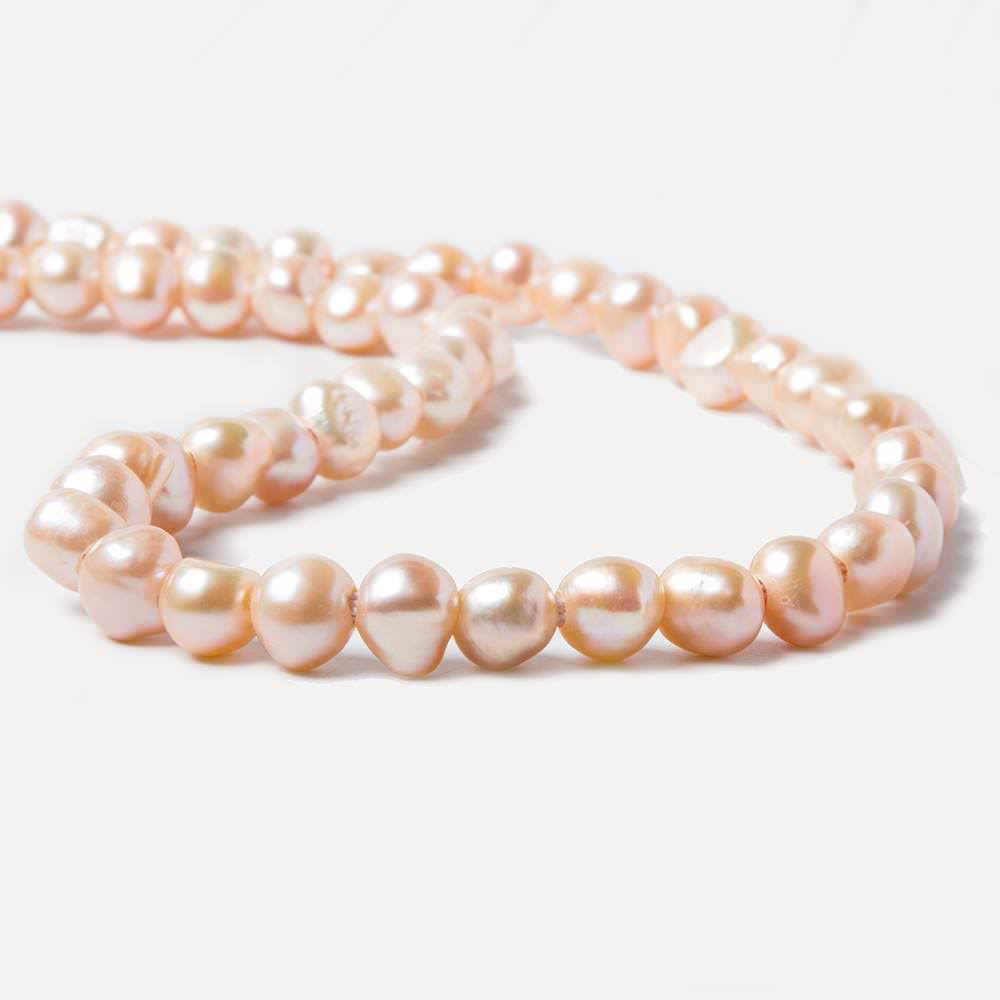 8-10.5mm Dark Salmon Baroque 2.5mm Large Hole Pearls 15 inch 49 pieces