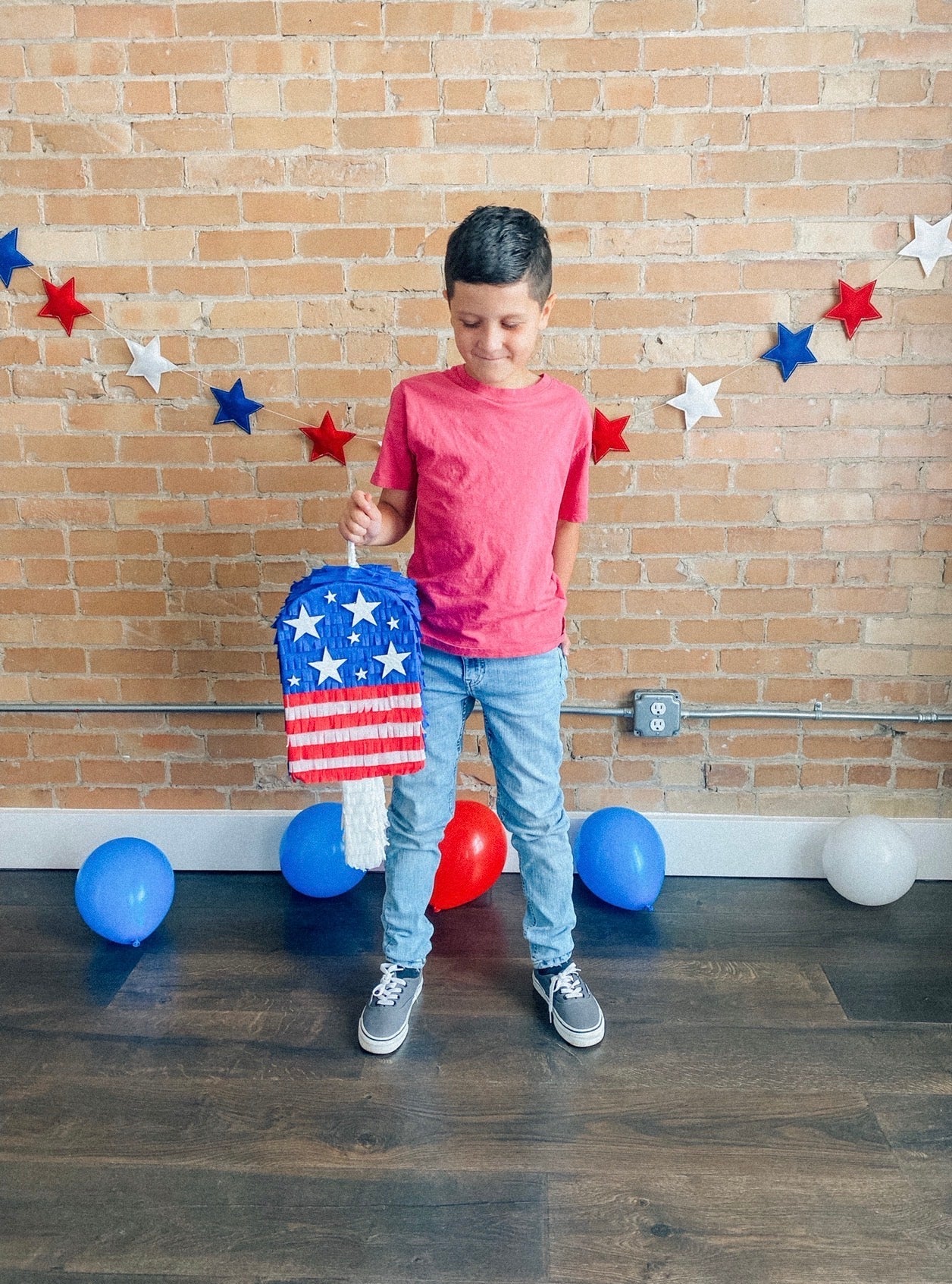 July Popsicle piñata (red,white,blue strips)