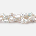 8x6.5-10x7mm Off White Keshi Straight Drilled Freshwater Pearl 16 inch 45 Beads